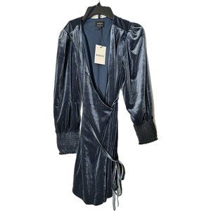 Bernie Velour Dress that features a faux-wrap silhouette and a soft velvet fabri